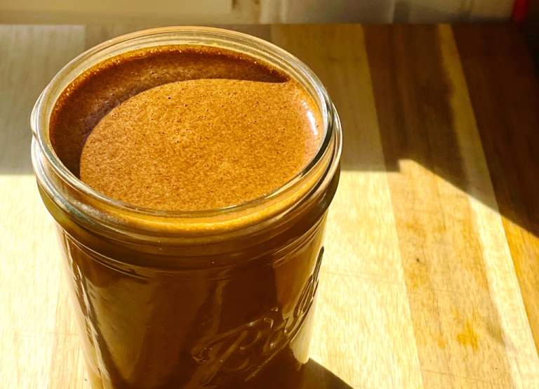 Chicory root coffee substitute drink in a mason jar